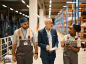 Warehouse employees walk and talk
